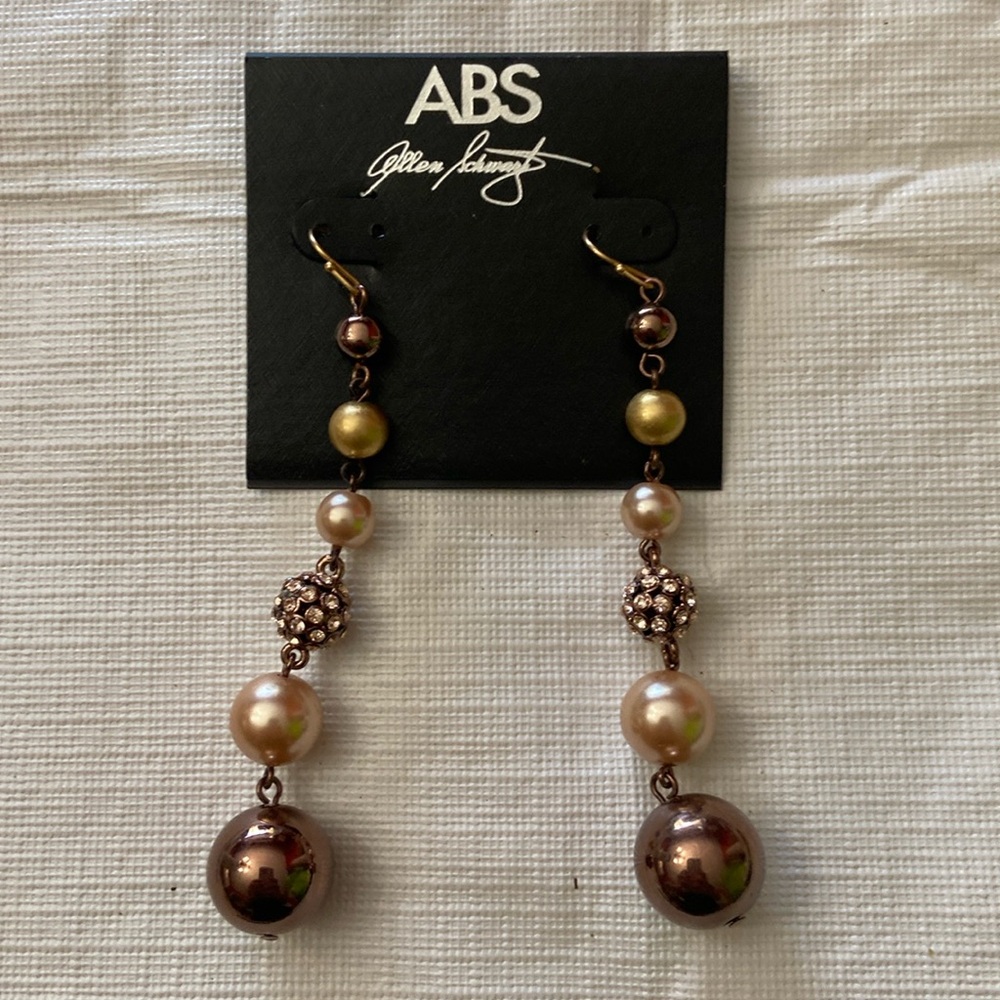 Gorgeous, hanging pearl and gemstone earrings from Neiman Marcus